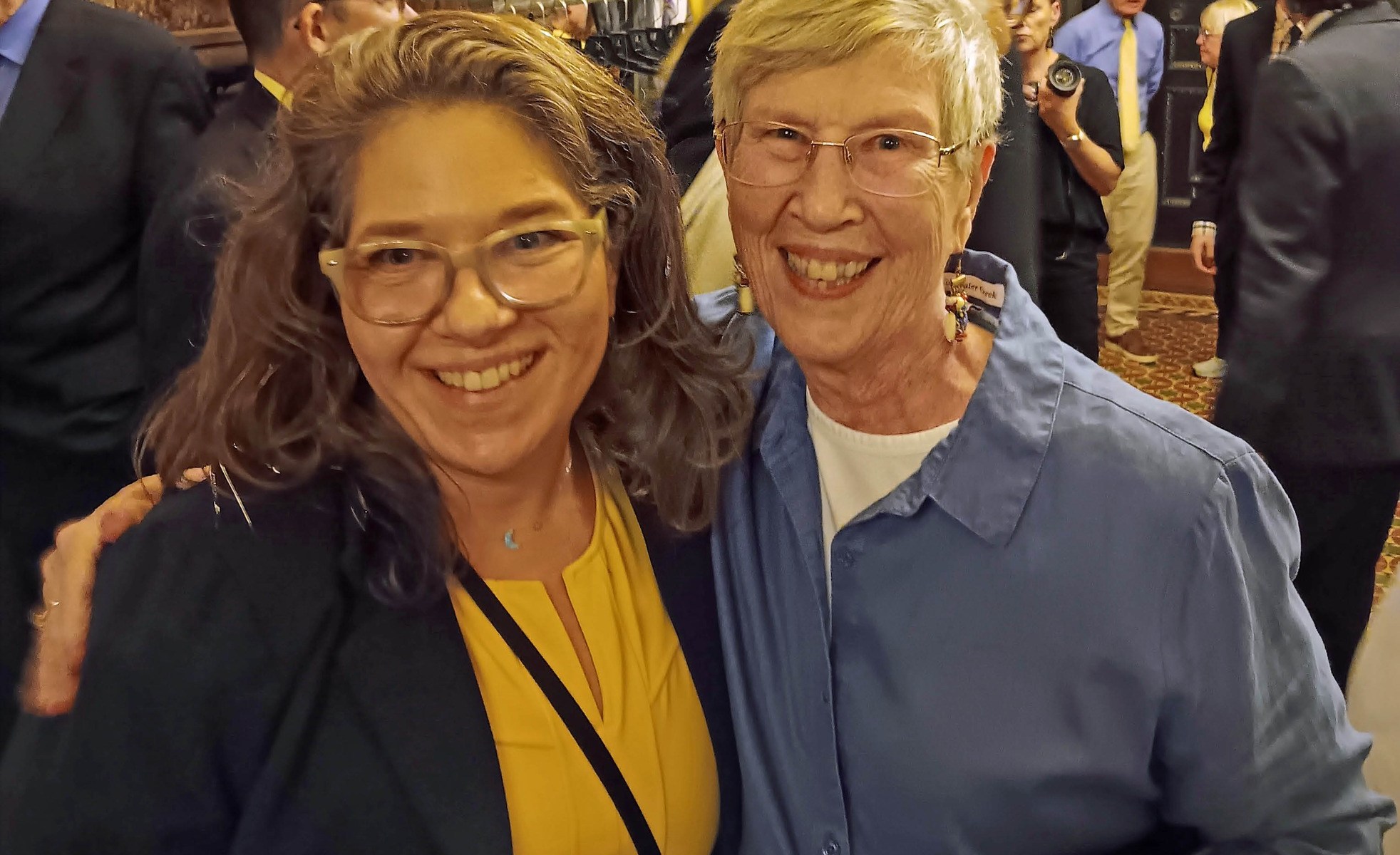 AVfC board member Nancy Murphy celebrating with Corinne Carey, NY campaign manager for Compassion & Choices